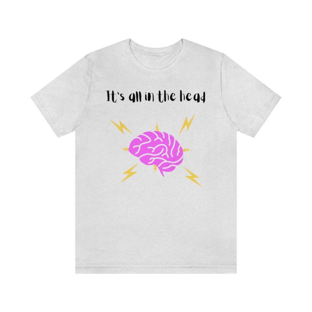 An ash colored t-shirt with the text "It's all in the head" with a drawing of a brain under it with thunderbolts and lightning around it.