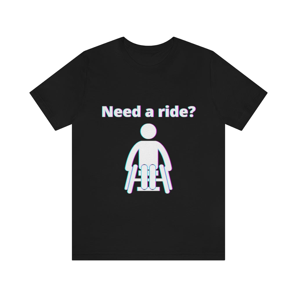 Black t-shirt with a person in wheelchair with text in glitch effect saying: "Need a ride?"