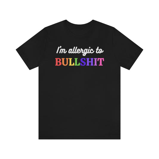 A black t-shirt with white text "I'm allergic to" and in rainbow colored letters "Bullshit"