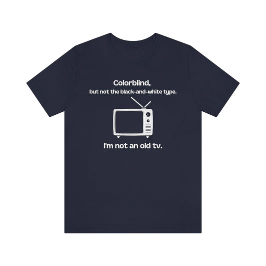 Navy t-shirt with white text around an old tv reading: "Colorblind, but not the black-and-white type. I'm not an old tv."