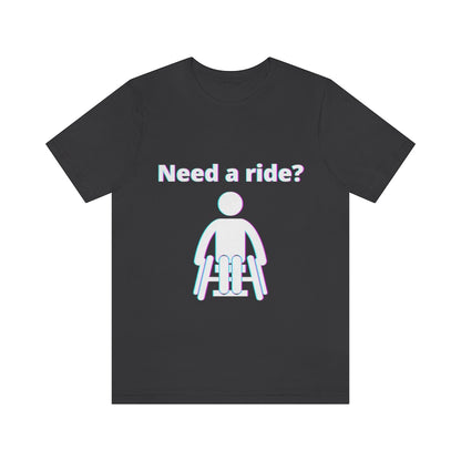Black t-shirt with a person in wheelchair with text in glitch effect saying: "Need a ride?"