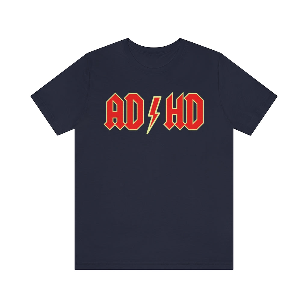 Navy colored t-shirt with red letters with a yellow outline and thunderbolt in the middle saying "ADHD"