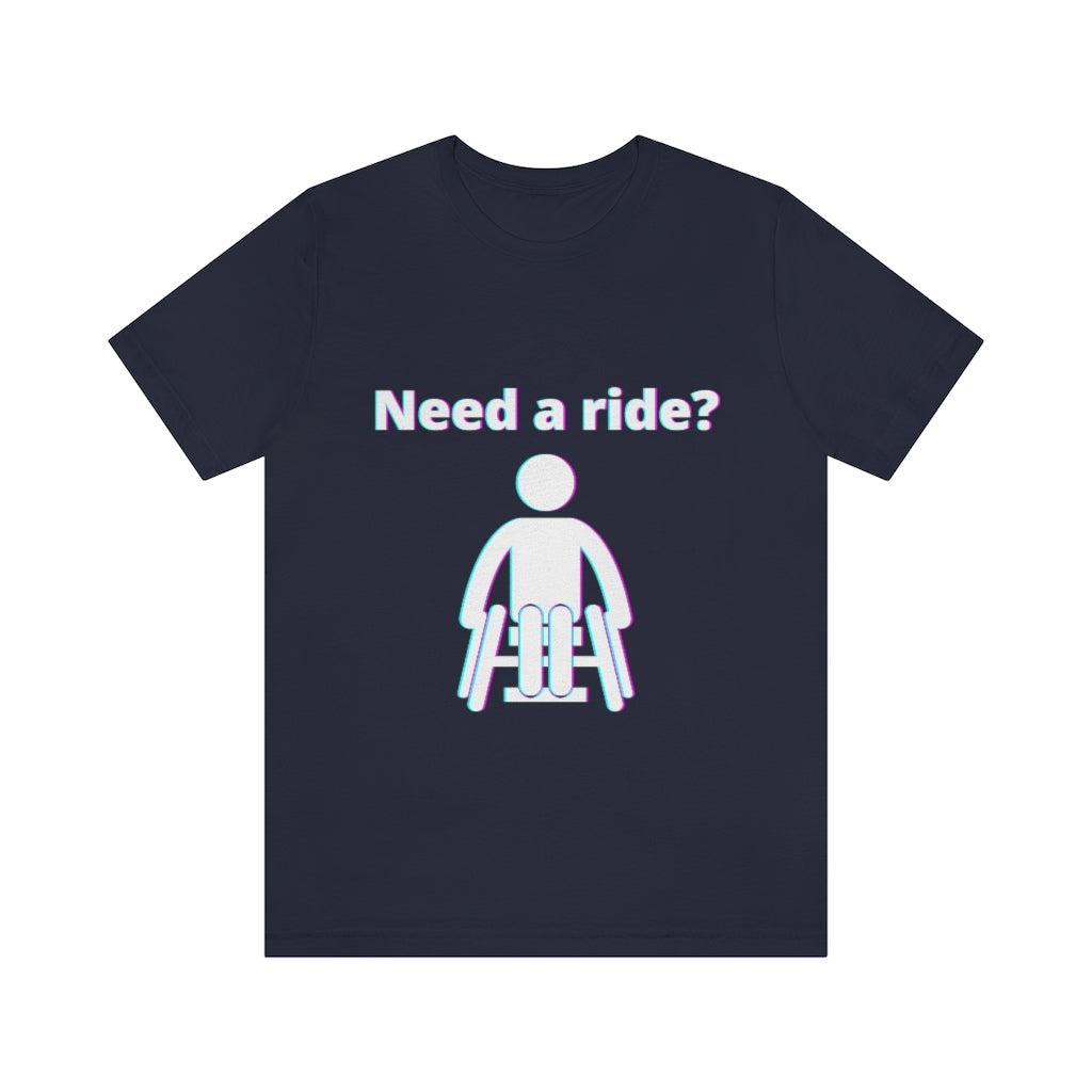 Navy t-shirt with a person in wheelchair with text in glitch effect saying: "Need a ride?"