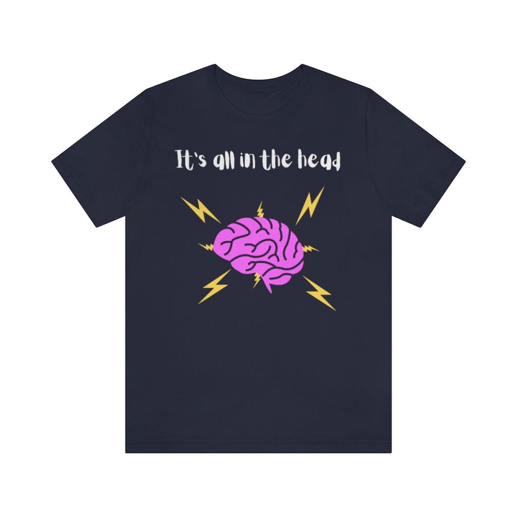 A navy colored t-shirt with the text "It's all in the head" with a drawing of a brain under it with thunderbolts and lightning around it.