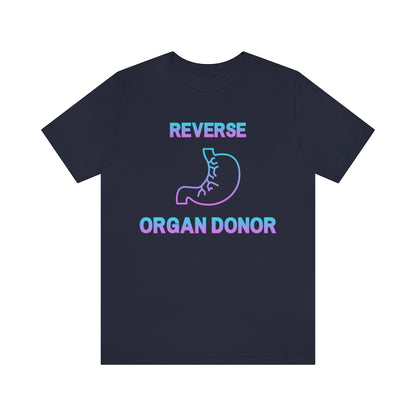 Navy colored t-shirt with gradient (blue to pink) text and a stomach icon saying: "Reverse organ donor".