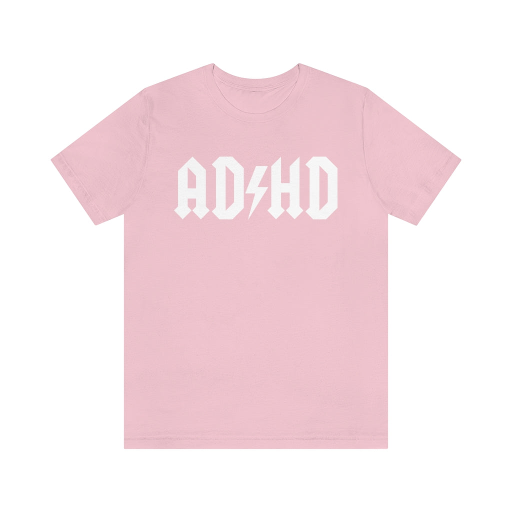 Pink colored t-shirt with white letters with and thunderbolt in the middle saying "ADHD"
