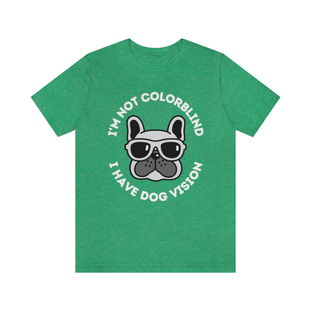 A heather kelly colored t-shirt with an image of a bulldog wearing sunglasses. Around it the text "I'm not colorblind, I have dog vision".