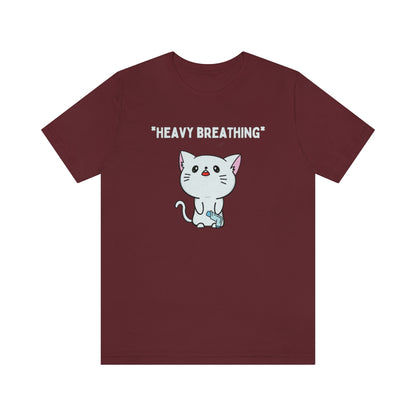 A maroon-colored shirt with in white text "*Heavy breathing*" and a cat standing upright