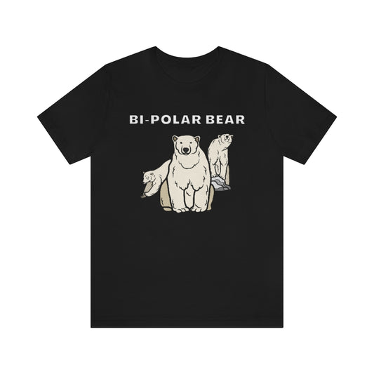 A black t-shirt with white text saying: "Bi-Polar bear). Under it are 3 bears: One staring neutrally at the viewer, on the right one on a rock looking happy and on the left one looking sad while jumping away.