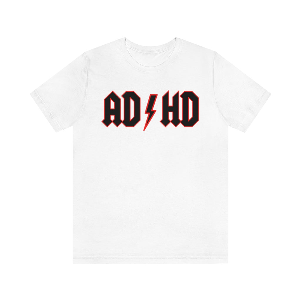 White colored t-shirt with red letters with a yellow outline and thunderbolt in the middle saying "ADHD"