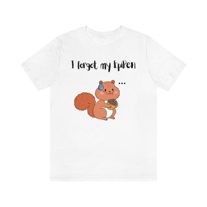 A white t-shirt with a cute drawn squirrel holding an acorn in his hands. A teardrop on top of his head and 3 dots on his side with the text "I forgot my EpiPen". His cheeks are filled.